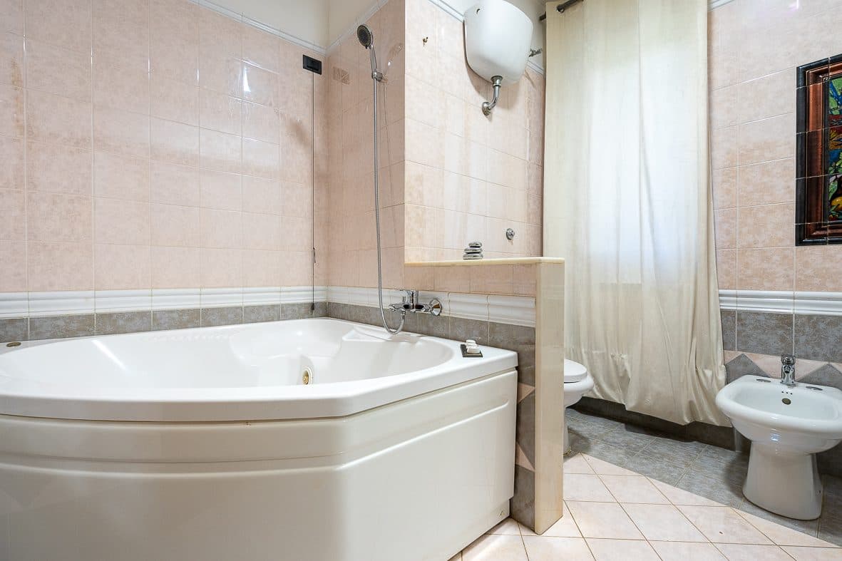 Bathroom with hot tub